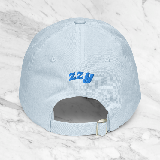 Gorra tono pastel.