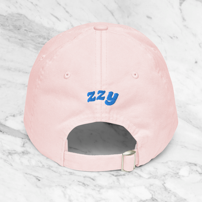 Gorra tono pastel.